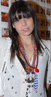 Ally Hilfiger with bead necklace